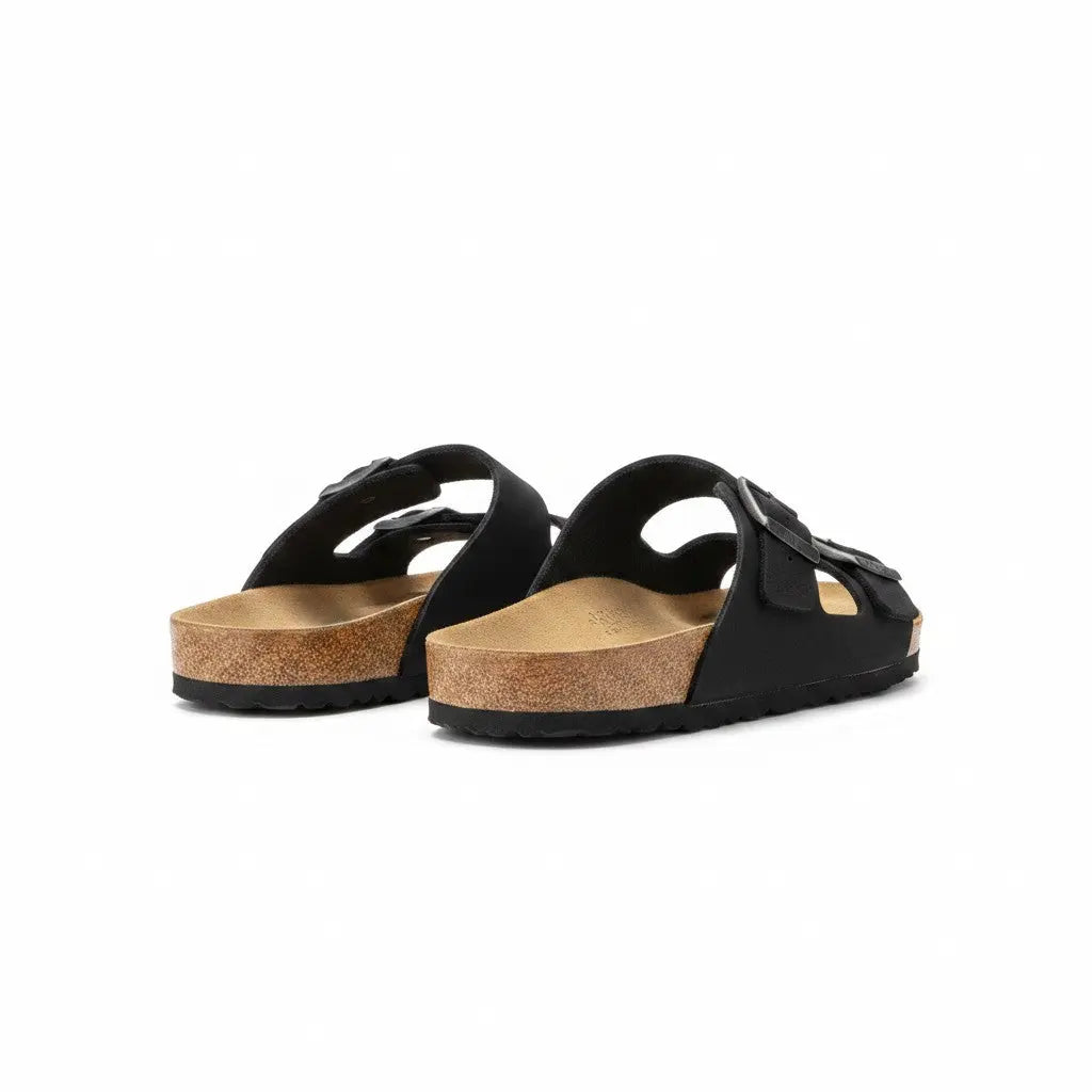 Sandales noires JUST EMPORIO Fresh & Found avec deux brides, boucles gunmetal et semelle en liège confortable.
