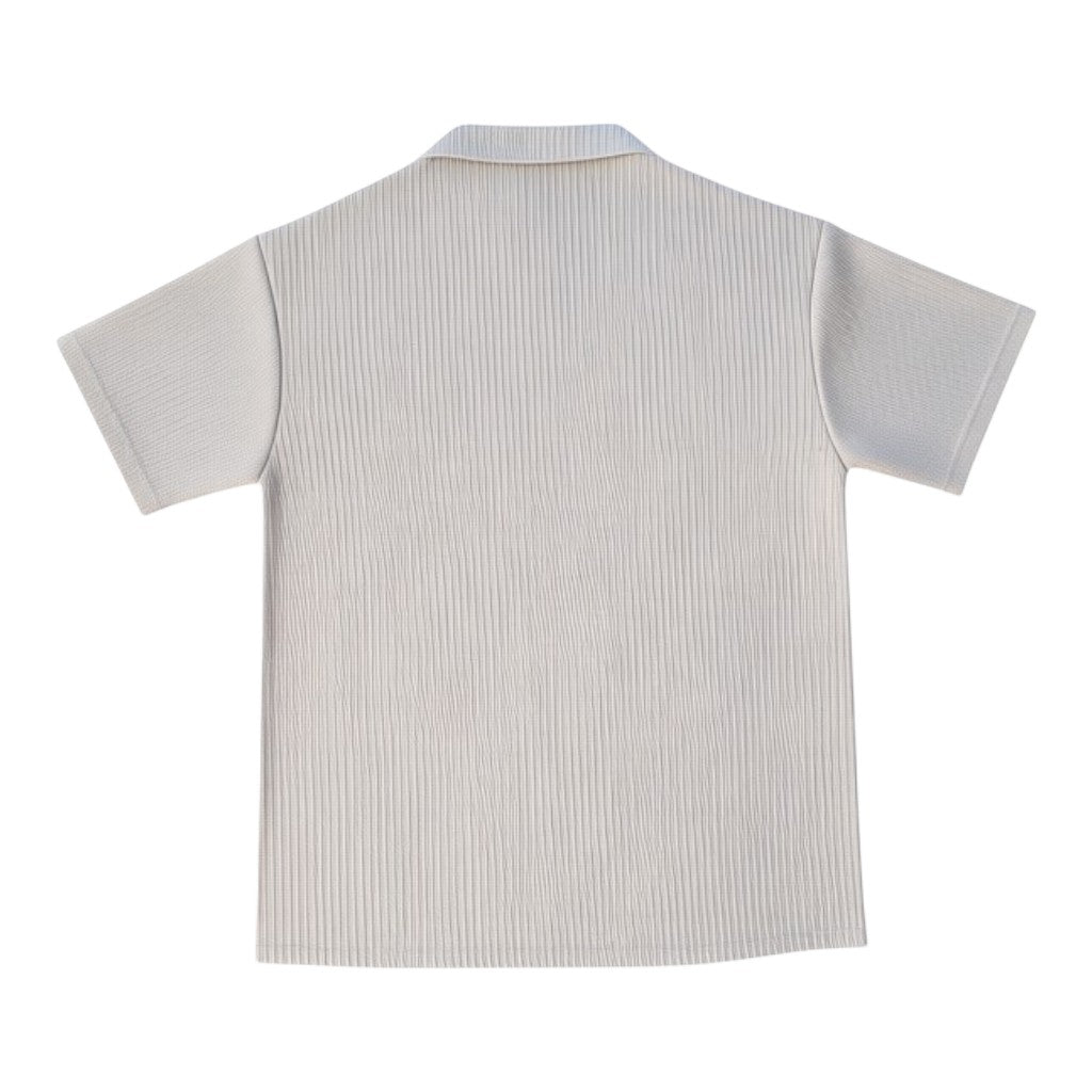 Klothco Kaporal beige short-sleeved button-down shirt with a textured vertical ribbed fabric and camp collar
